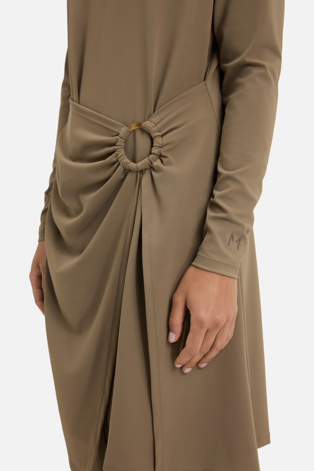 Merrachi — a signature draped look from the collection